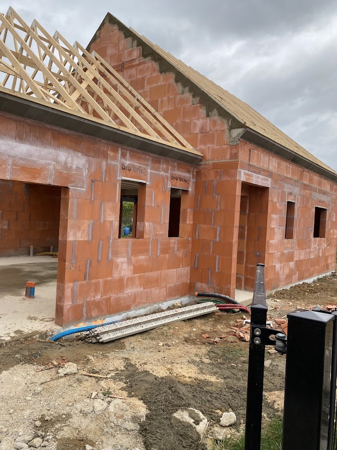 Réalisation d’une maison individuelle en briques rouge