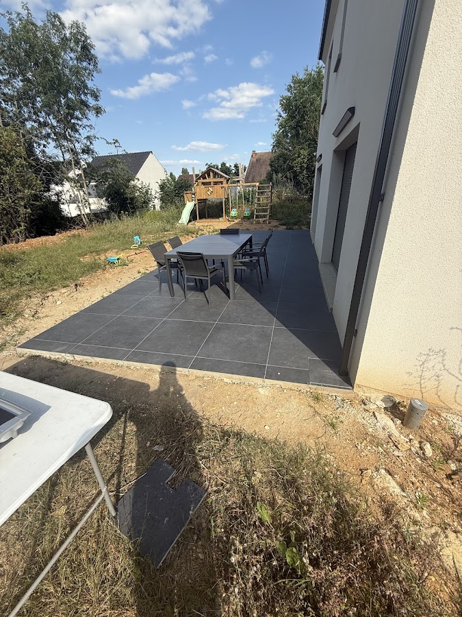 Réalisation d'une dalle béton avec pose de carrelage